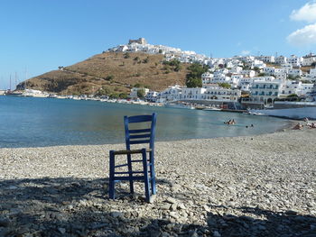 Calm sea with mountain in background