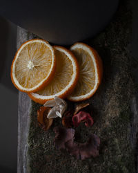 Close-up of orange fruit on wood