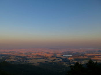 Idyllic shot of landscape against sky during sunset