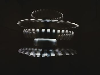 Close-up of lamp over black background