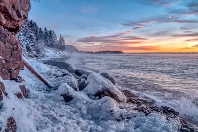 Scenic view of sea against sky during sunset