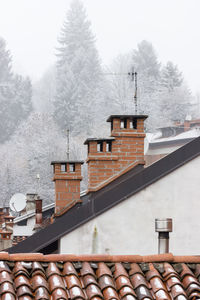 House against sky during winter