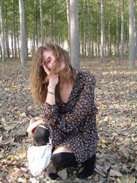 Young woman in forest