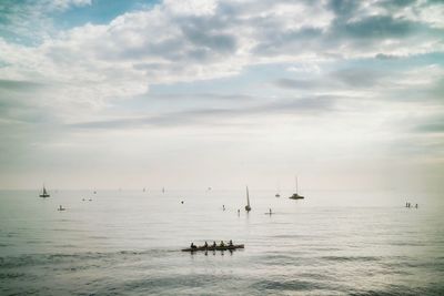 Scenic view of sea against cloudy sky