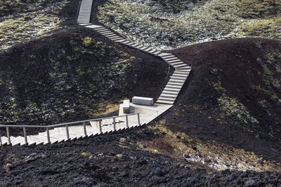 High angle view of wooden stair case along the grabrok crater 