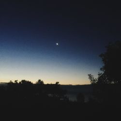 Scenic view of landscape against sky at night