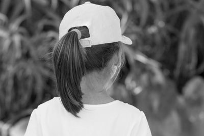 Rear view of girl wearing cap