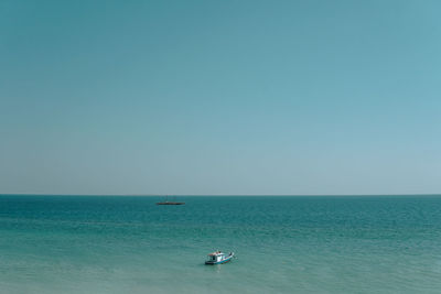 Sky blue scenic view of sea against clear sky