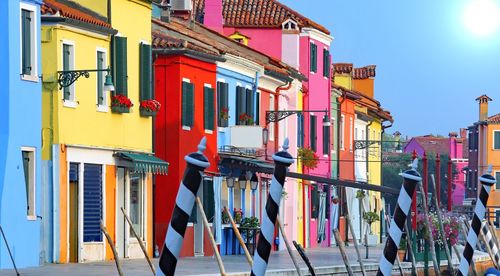 Multi colored buildings against sky