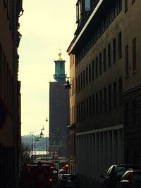 Street in city against sky