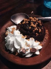 High angle view of chocolate cake in plate on table