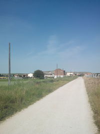 View of road against blue sky