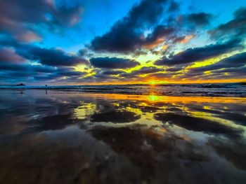 Scenic view of sea against sky at sunset