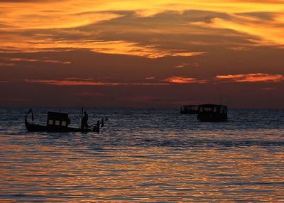 Scenic view of sea at sunset