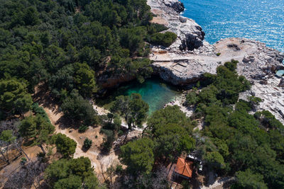 High angle view of townscape by sea