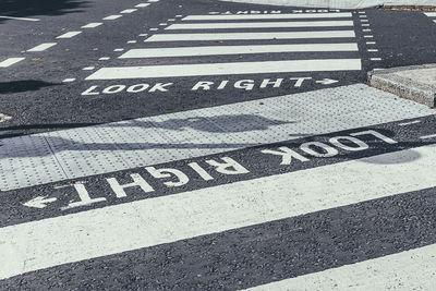 High angle view of text written on road