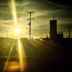 Electricity pylon at sunset