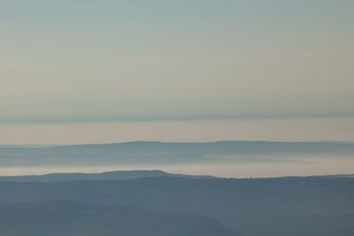 Scenic view of mountains against sky during sunset