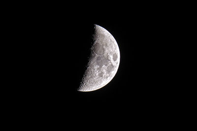 Low angle view of moon against sky at night