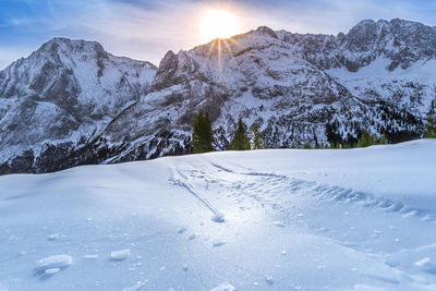 Snow covered mountain against sky