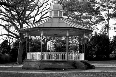 Gazebo in park against building