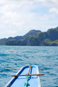 Sailboat on sea against sky