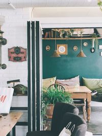 Potted plants on table in restaurant