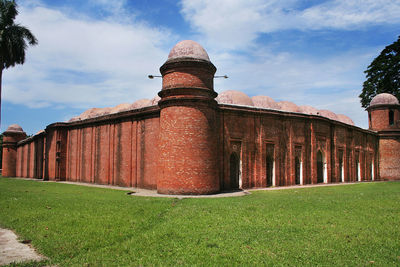 Low angle view of old building against sky