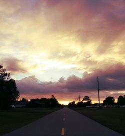 Empty road at sunset