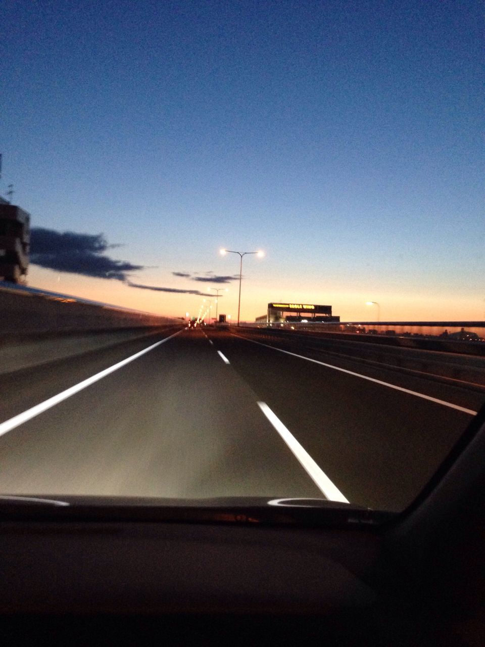 transportation, road, the way forward, road marking, diminishing perspective, vanishing point, mode of transport, highway, sky, windshield, empty, blue, journey, country road, no people, long, landscape, outdoors, nature