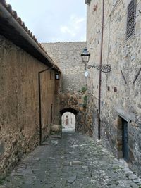 Narrow alley amidst old buildings