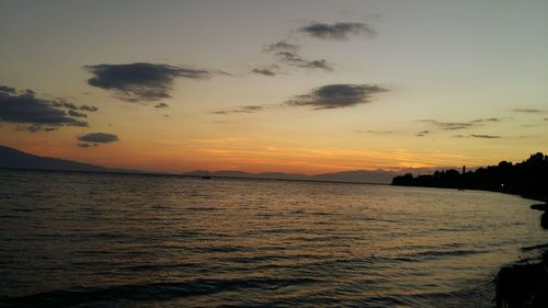 Scenic view of calm sea at sunset