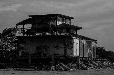 Built structure against cloudy sky