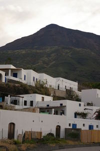 Buildings in city against sky