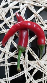 High angle view of tomatoes in basket on table