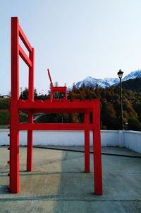 Red structure against clear sky