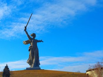 Low angle view of statue against sky