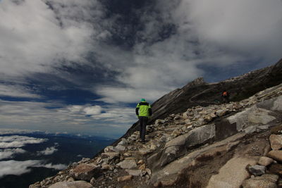 Man standing on rock formation