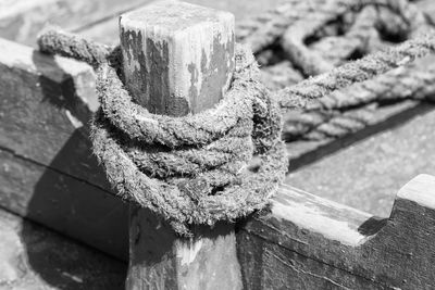 Close-up of rope tied on metal