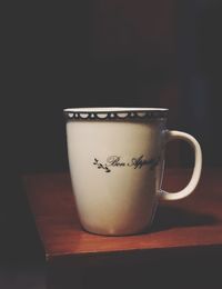 Close-up of coffee cup on table