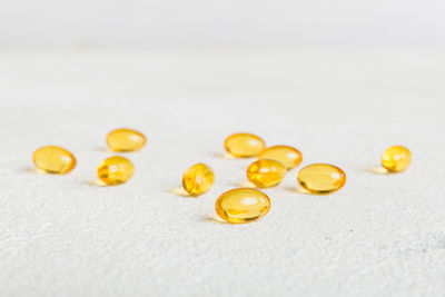 Close-up of pills on white background