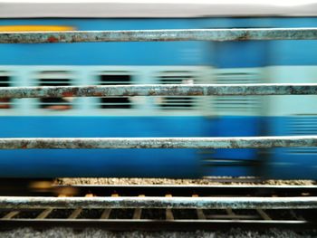 Blurred motion of train at railroad station platform