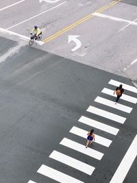 High angle view of people on road in city