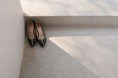 Low section of woman standing on floor