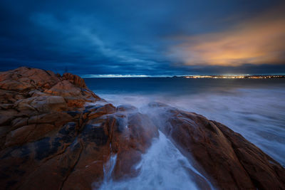 Scenic view of sea against sky at sunset