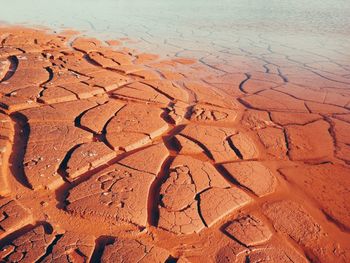 High angle view of mud on sand