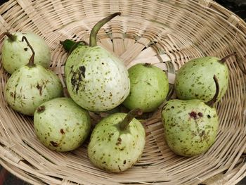 High angle view of calabash in basket