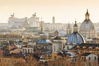 High angle view of city at sunset