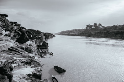 Ubon ratchathani, thailand - large sand stone canyon cliff shoreline of mae khong river