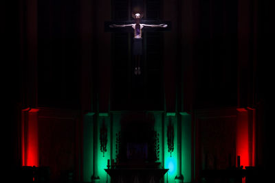 Close-up of illuminated lamp against black background